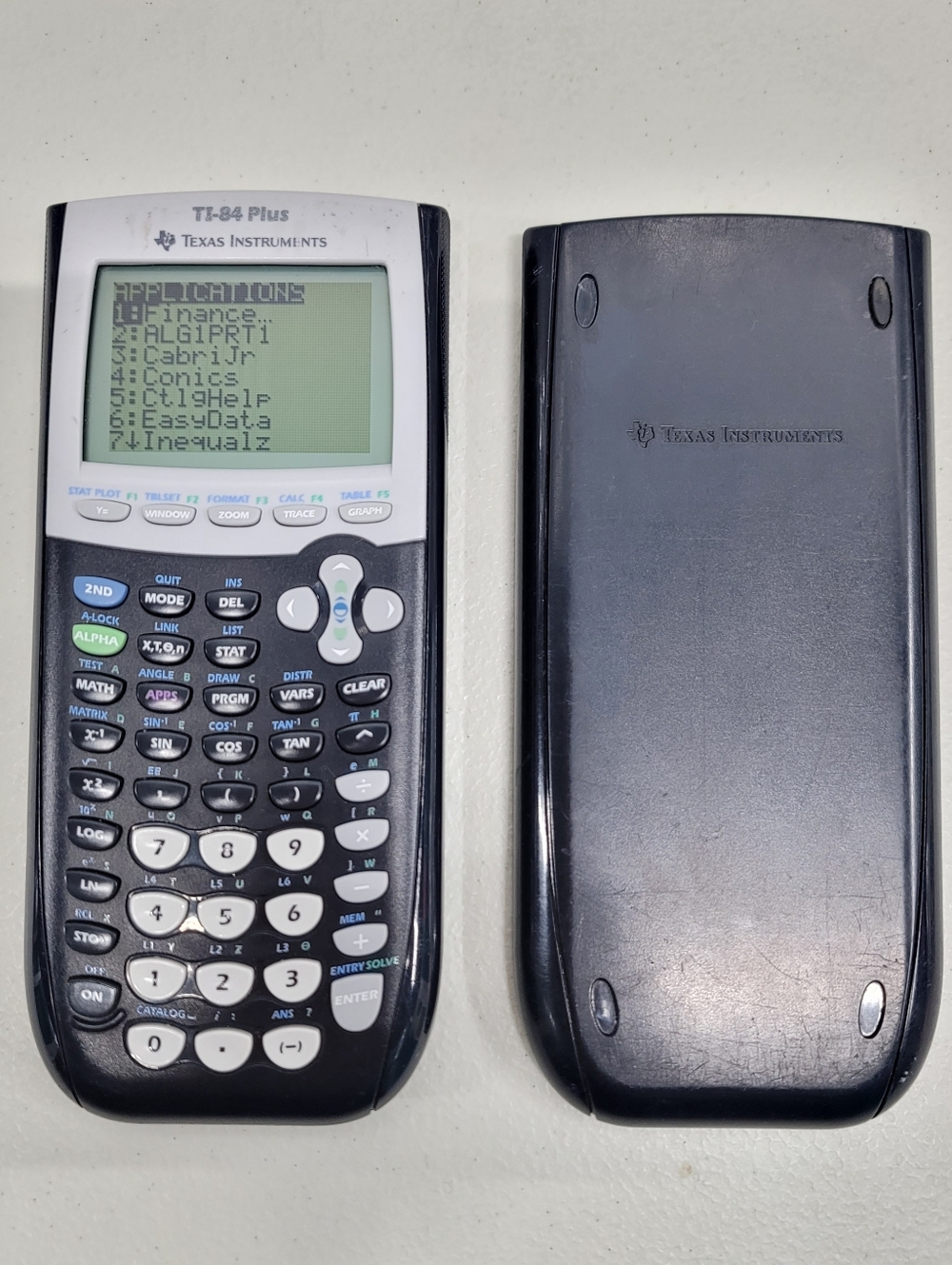 Texas Instruments Black TI-84 Plus Graphing Calculator With Cover